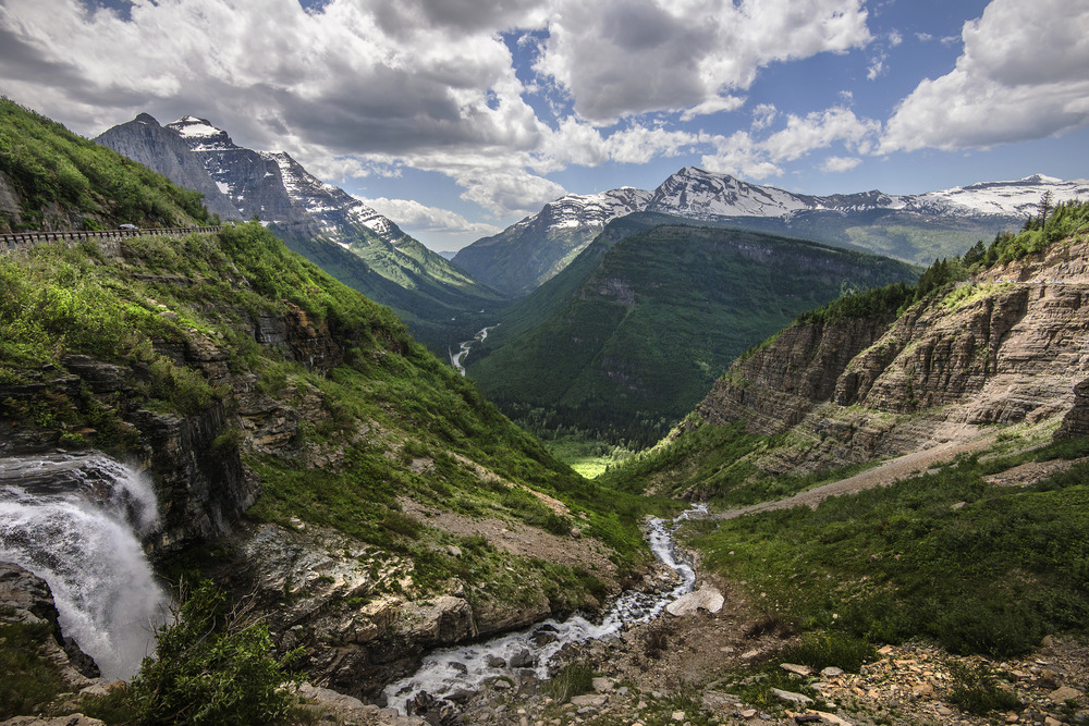 Valley view from above a waterfall.