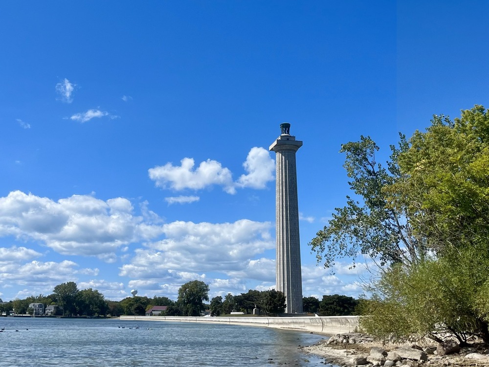 Tall Doric column near a lake